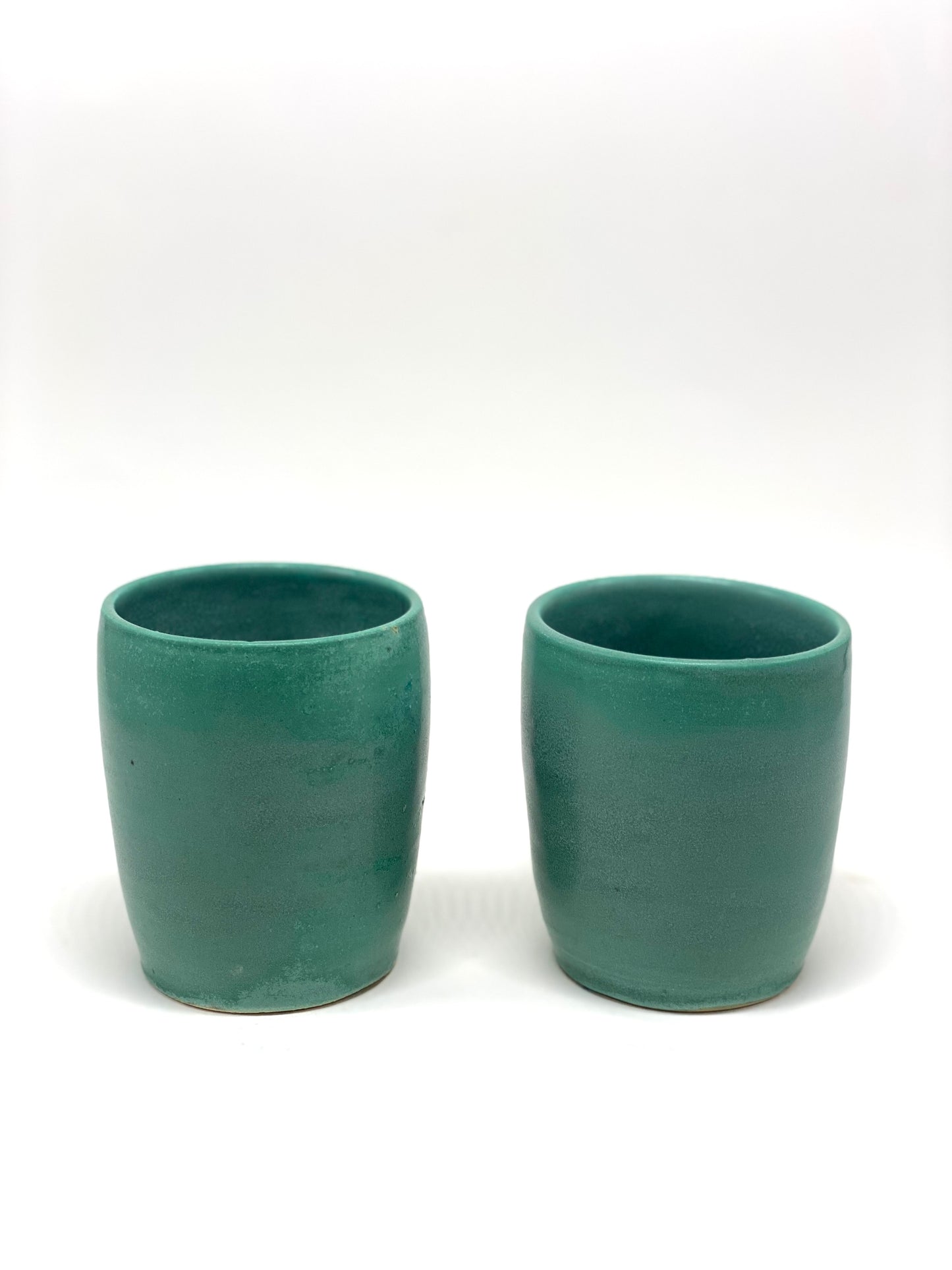 Green tumblers